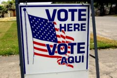 Bilingual Vote Here sign outside a polling place in Taft, Texas.